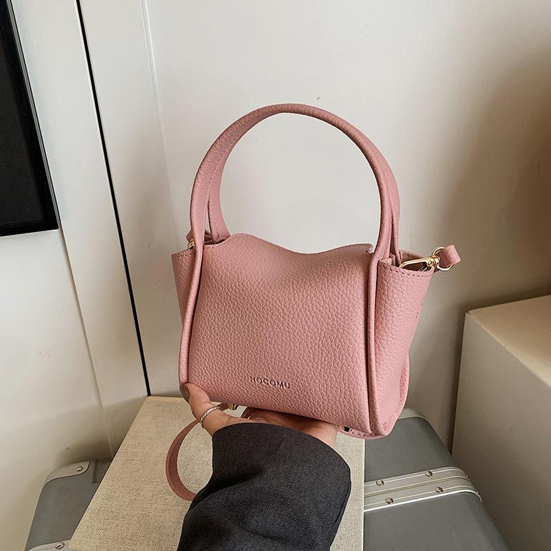 Spring women's bag niche high-end handbag 2025 new simple vegetable basket bag versatile shoulder messenger bag