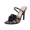 Three-dimensional flower decoration rear lift with round head high heels sandals black high heels