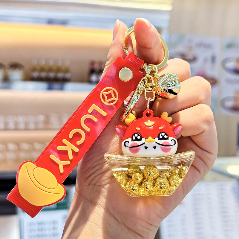 Akrylový přívěsek na klíče s tekutým pískem a obsahem oleje - Perfektní malý dárek na tašku nebo do auta.