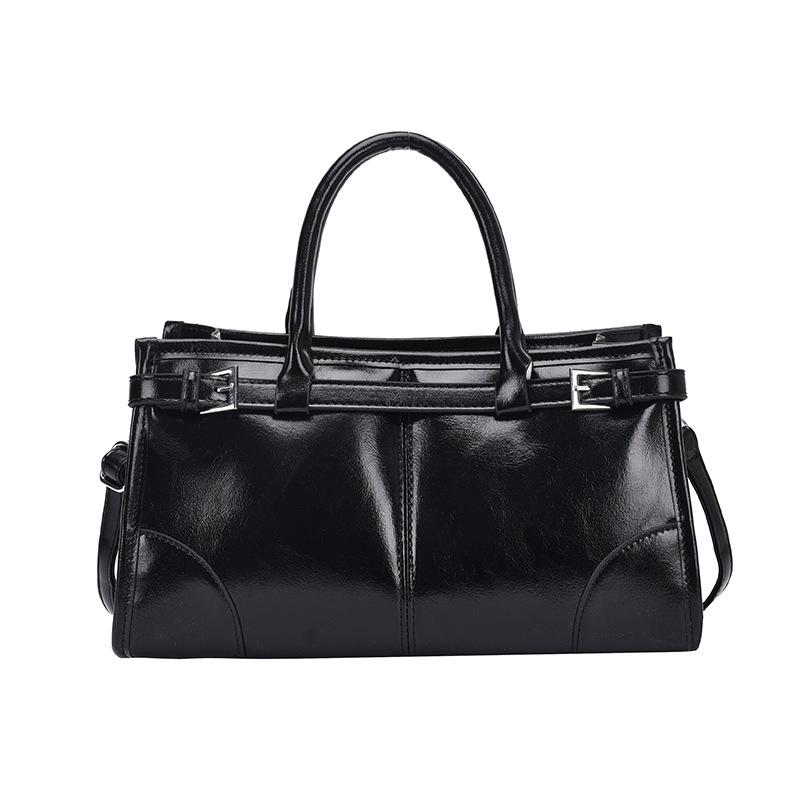 Однотонная вместительная сумка через плечо из полиуретана — фото 5