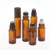 5ml 10ml Bursztynowe Przezroczyste Szklane Butelki Roll-on Plastikowa Nakrętka Imitująca Drewno Próbne Buteleczki z Kulka do Olejków Eterycznych Perfum