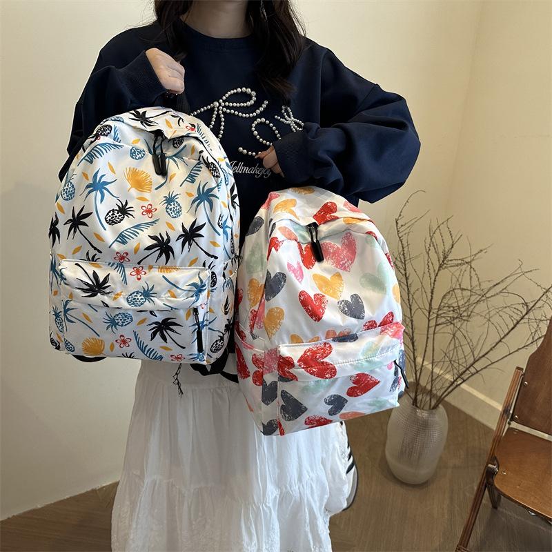 School bag female Mori junior high school girl backpack high school college student graffiti color matching lightweight backpack
