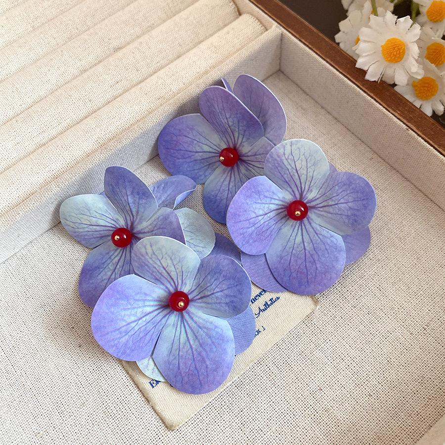 

Seaside vacation wind silver needle pearl flower fringed earrings light luxury high-end earrings sweet small fresh earrings women