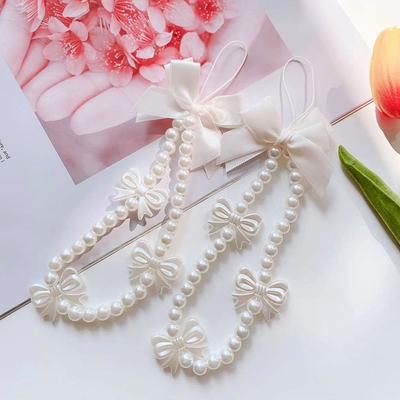 Telefoon accessoires – Telefoonbandjes en sleutelhangers
