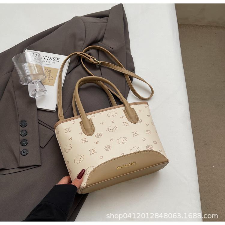 

Портативная сумка-ведро маленькая женская 2025 новая корейская версия иностранный стиль сумка для поездок модный нишевый дизайн на плечо сумка-мессенджер