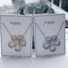 Korean Version Of Temperament Hollow Flower Earrings Personalized Full Diamond Stud Earrings Women'S Silver Needle Copper High-End Earrings