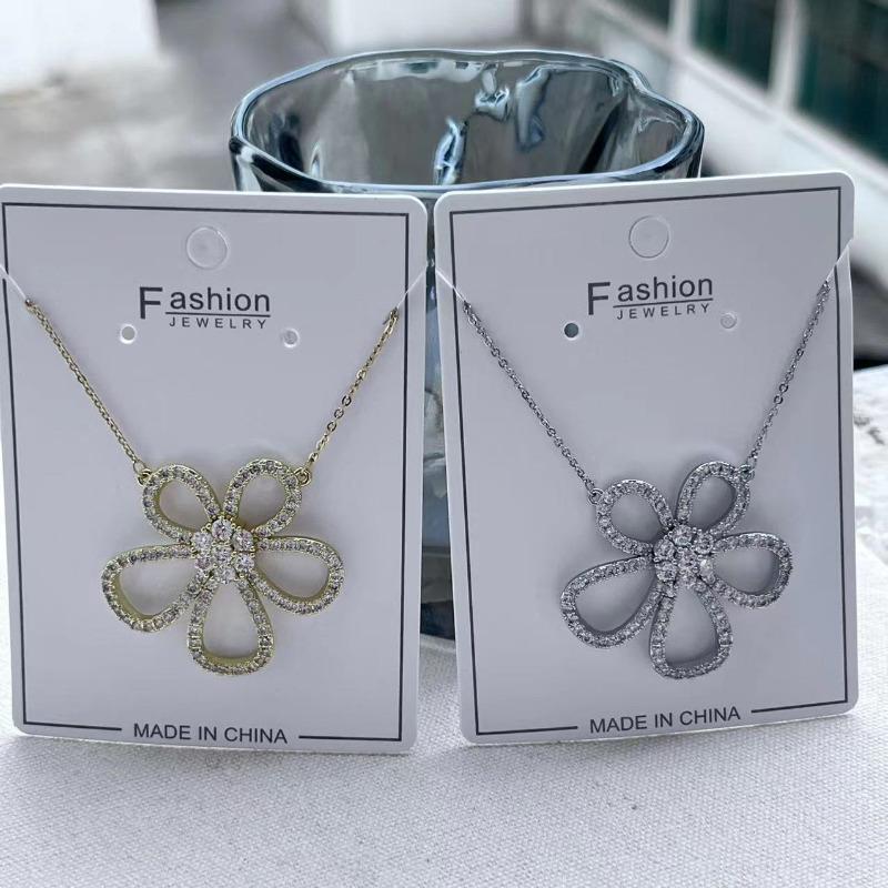 Korean Version Of Temperament Hollow Flower Earrings Personalized Full Diamond Stud Earrings Women'S Silver Needle Copper High-End Earrings