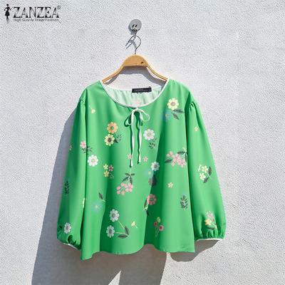 Blusa informal holgada con cuello redondo y manga larga con estampado floral para mujer