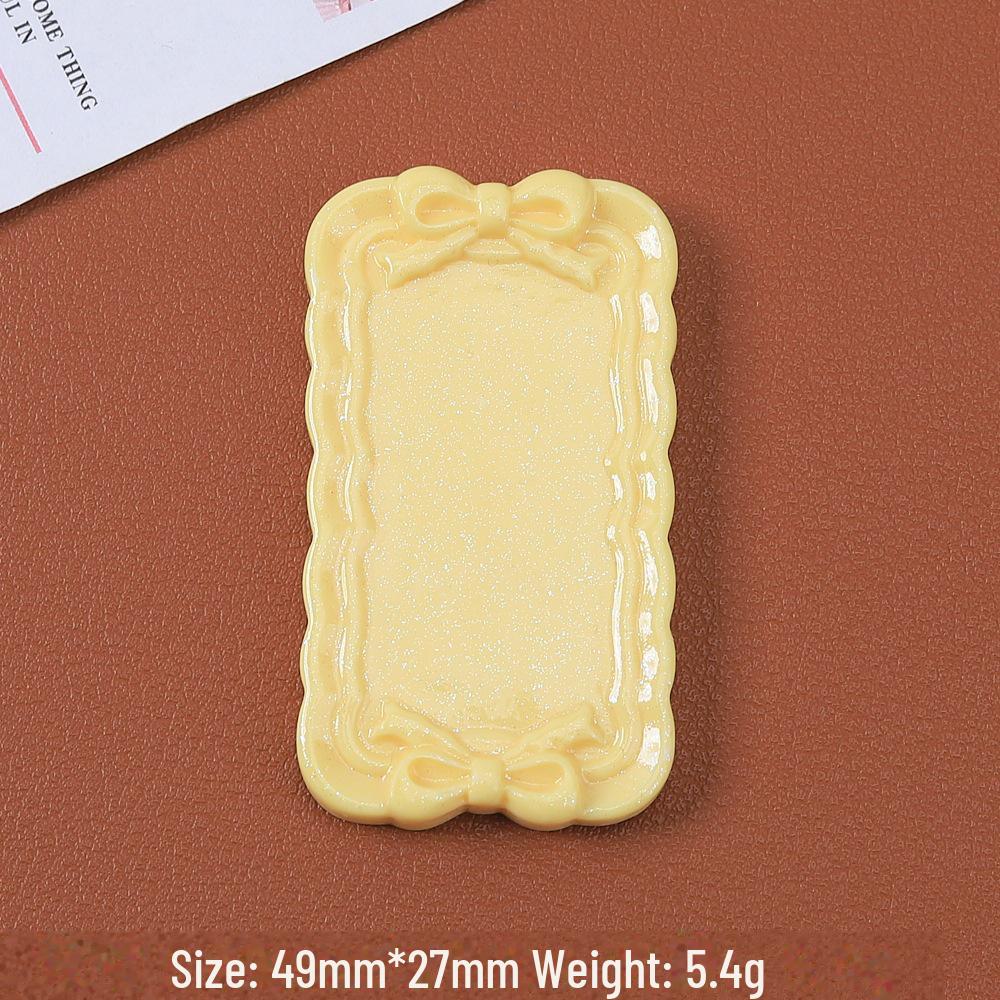 Tegneseriesløyfemønster harpiksplate for DIY hårnål og magnetlaging