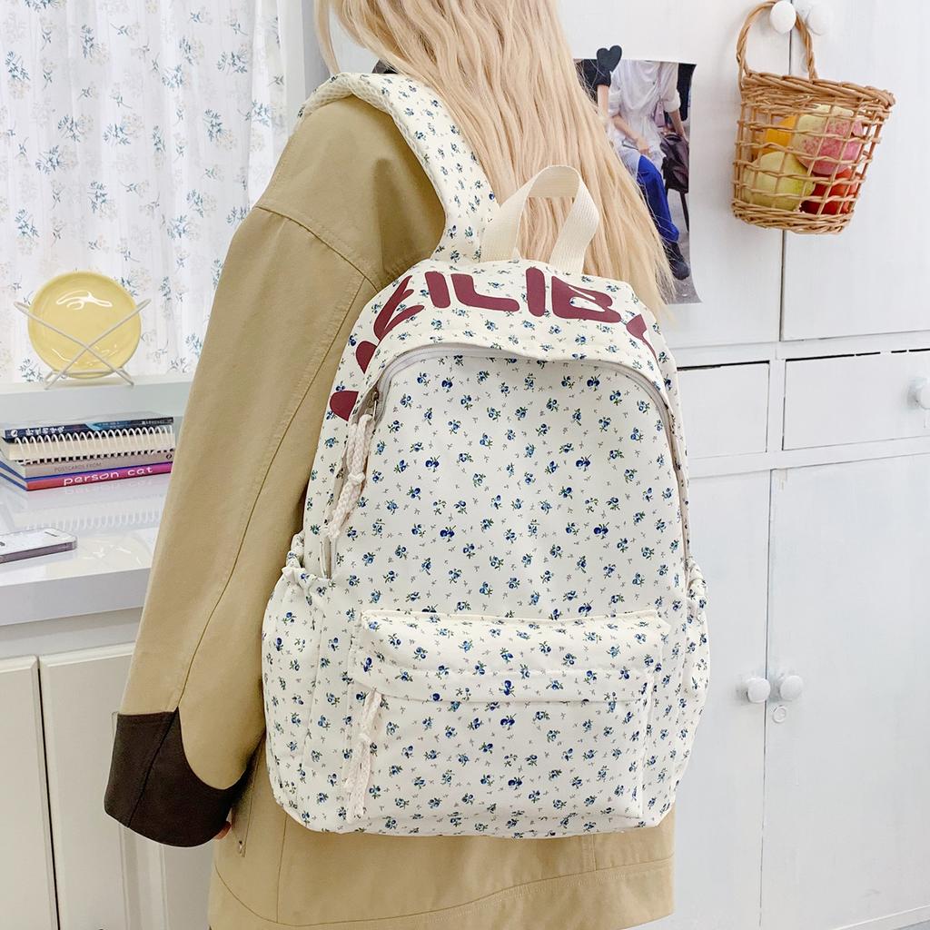Schoolbag schoolbag female junior high school student high school student campus large capacity double shoulder floral letter ins style high niche