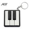 Geschenk für Klavierschüler Mini-Schlüsselanhänger, Key Clicker, Spielbares Fingerspitzen-Stressabbau-Spielzeug für Pendler mit Metallring, Klassische Schwarz-Weiß-Tasten für Musik
