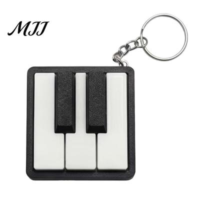 Piano Student Gift Mini Keychain, Key Clicker, Playable Fingertip Stress Relief Toy Commuter with Metal Ring, Classic Black White Keys for Music