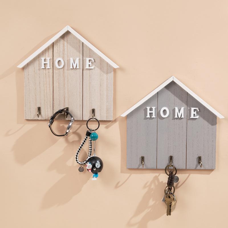 Řada kreativních nástěnných háčků pro zavěšení klíčů do vstupní chodby