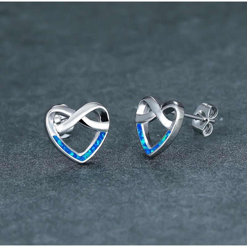 Hot-selling white woven love stud earrings, simple and versatile fashion temperament earrings