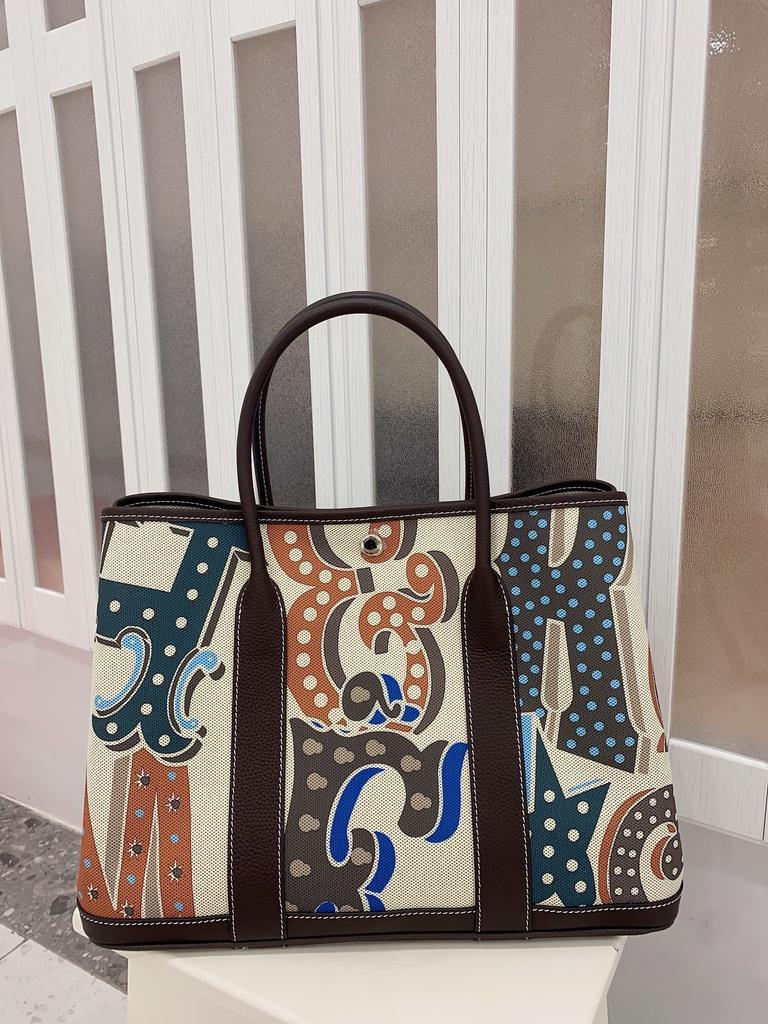 2025 Canvas With Top Layer Cowhide Women's Bag Garden Handbag Large Capacity Leather Contrasting Single Shoulder Tote