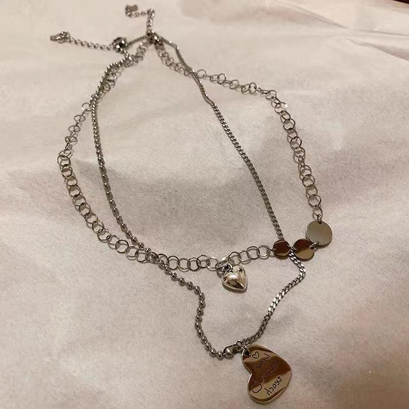 

Trendy Korean Heart & Pearl Necklace with Versatile Collarbone Chain Design for Women