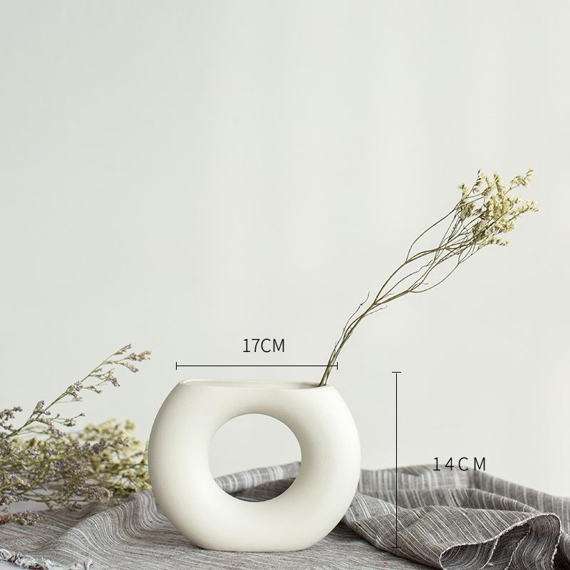 White Ceramic Vase with Dried Baby's Breath for Living Room or Dining Table Decoration