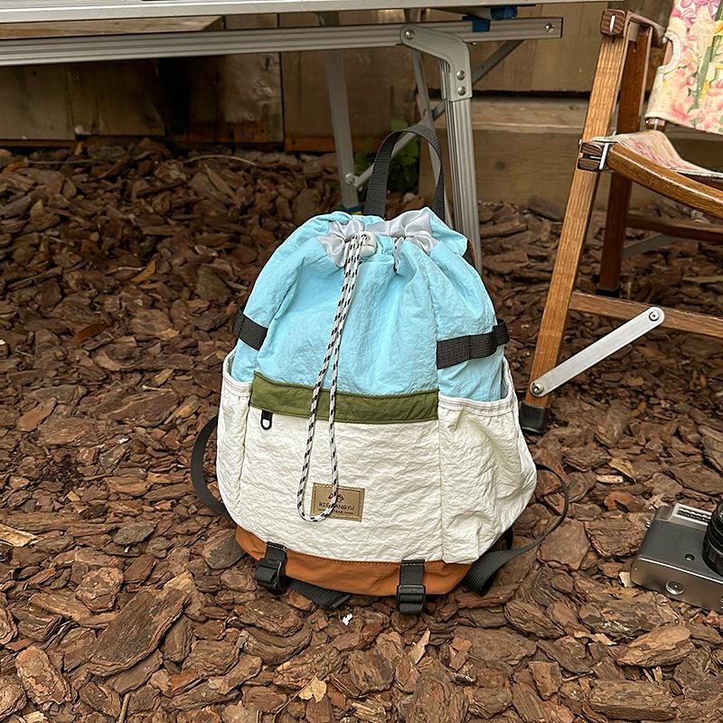 New couple backpack lightweight drawstring bundle backpack 2025 simple fashion large capacity mountaineering bag backpack women