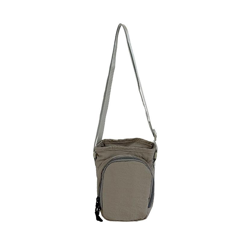 

Shoulder bag Versatile commuter bag Outdoor leisure sports Water cup Kettle bag Travel light mobile phone messenger bag сірий колір