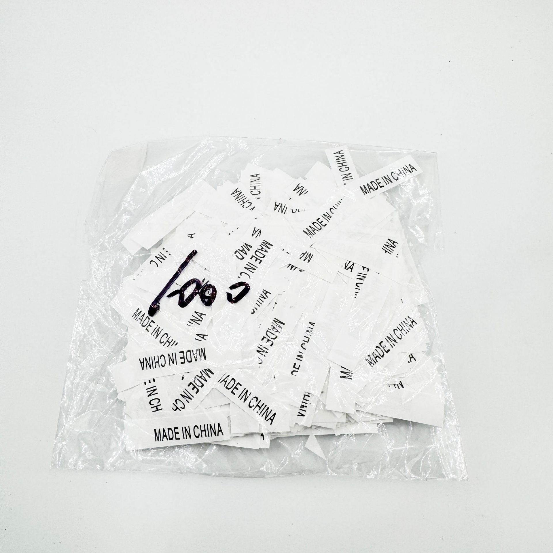 

Этикетка по уходу за одеждой Made in China с отметкой о происхождении