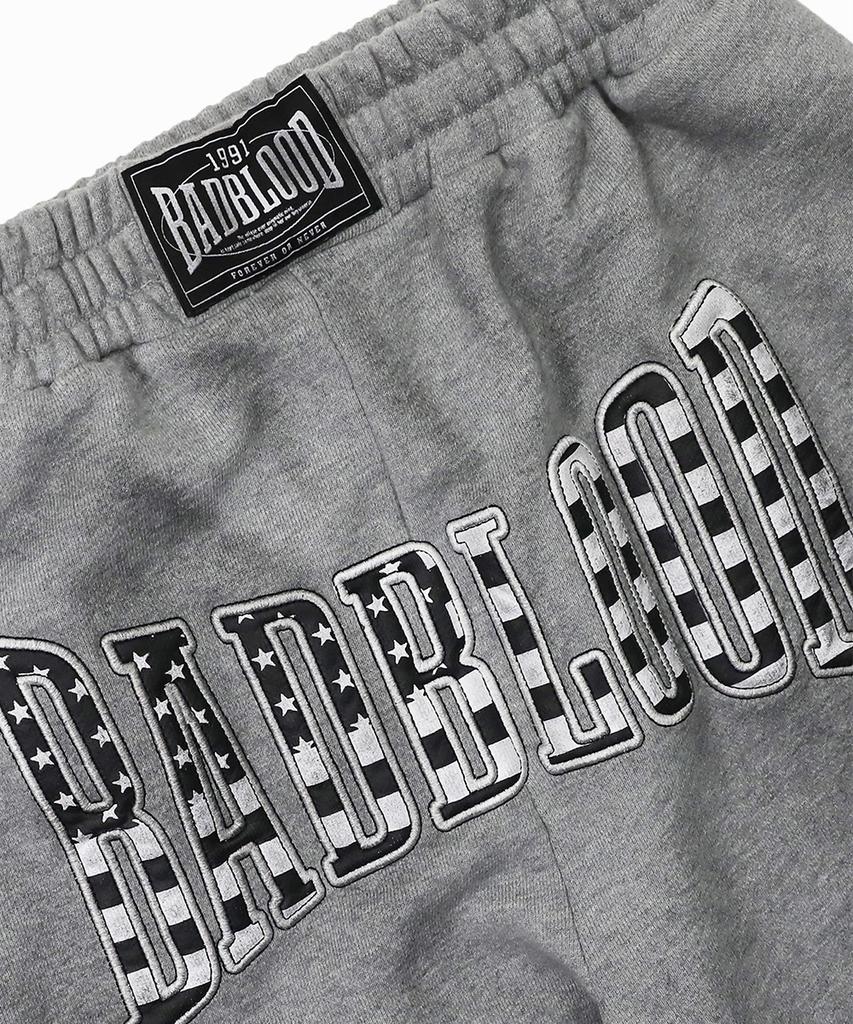 BADBLOOD Shield Old Glory 2-Way Curved Jogger Trousers - Dusty Gray