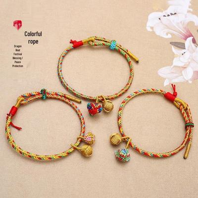Dragon Boat Festival Zongzi Bracelet: Five-Color Thread, Traditional Craftsmanship, Gold Ball Accent.