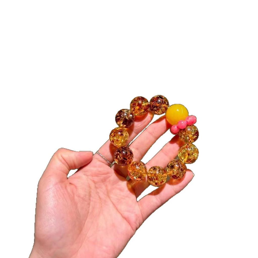 Luxus-Sammlerarmband in Honigbernstein mit Rosenperlen - Reichtum anziehen