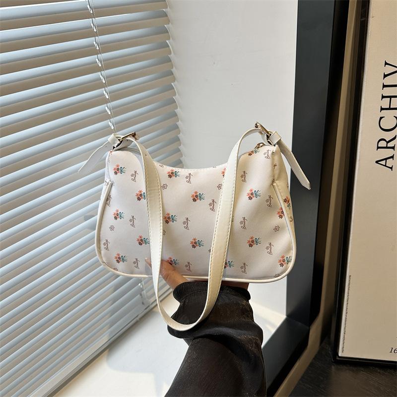 Spring new popular retro texture armpit bag women's fashion versatile shoulder baguette bag tide