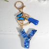 1pc Custom Blue Alphabet Letter Keychain with Butterfly Pendant Resin Ladies Key Ring with Tassel - Elegant Accessory for Bags Backpacks