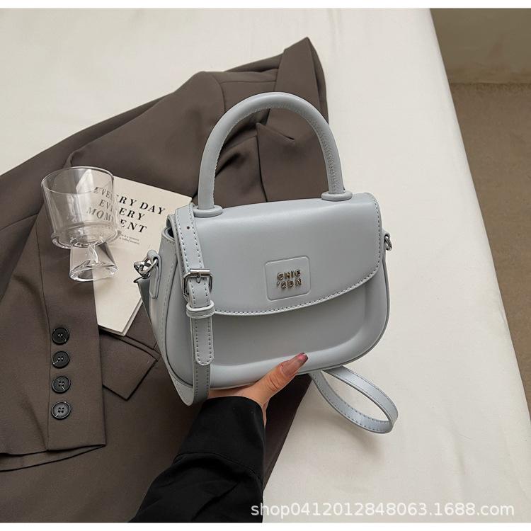 

This year s popular handbag fashion saddle bag women s new niche high-end shoulder bag commuter messenger bag синий