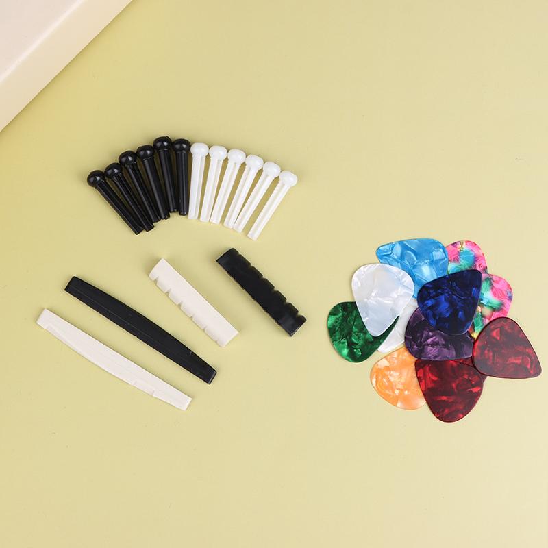 Kit di accessori per chitarra acustica da 48 pezzi/set Capotasto Corde Plettri Avvolgicorde Pin del ponte Sellette Kit di cura per chitarra All-In-One Per Principiante