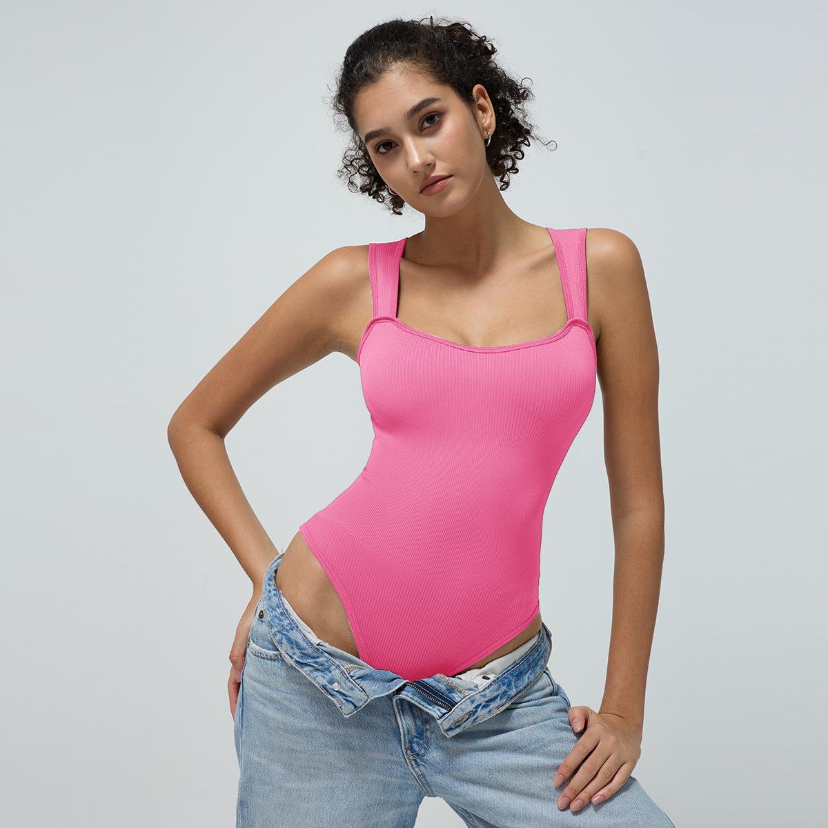 

Бесшовный комбинезон для йоги с треугольными лямками Small коралл красный