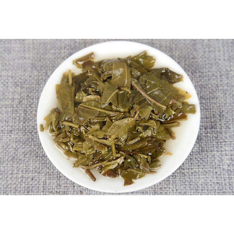 Pu'er Tea 2014 Spring Tea Ancient Tree Tea Yunnan Seven Seed Cake Tea 357g
