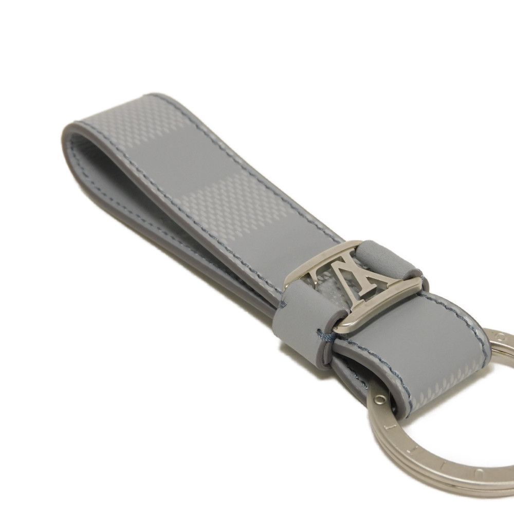 Used 12564 Porte-Clés Dragonne M64182 7950 LV logo embossed bag charm in excellent condition Damier Infini Arctic