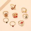 8-Piece European Christmas Rhinestone Ring Set: Tree, Santa, Bowtie & Reindeer Designs