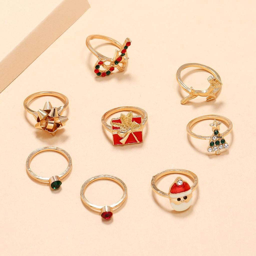 8-Piece European Christmas Rhinestone Ring Set: Tree, Santa, Bowtie & Reindeer Designs