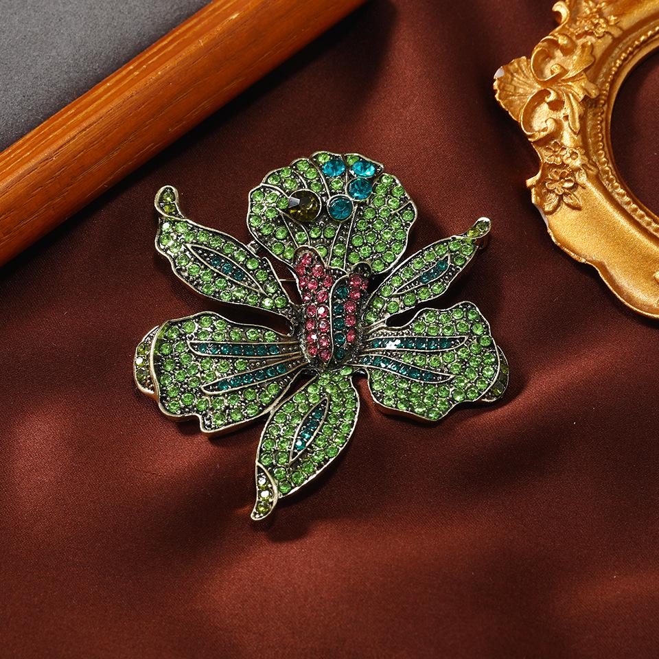 Orchid Rhinestone Brooch: Elegant Diamond Pin for Women's Coats - European & American Style
