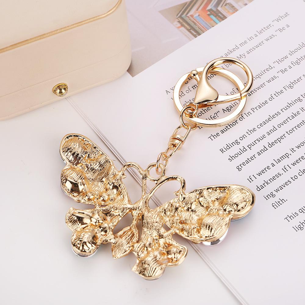 European & American Creative Rhinestone Butterfly Keychain: Unique Metal Moth Insect Charm for Backpack