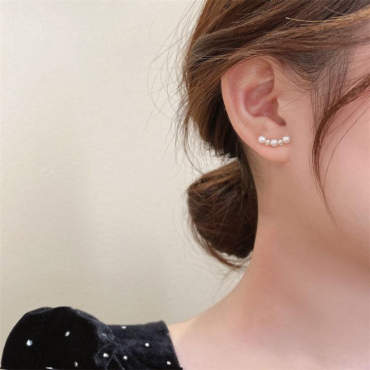 

Серьги с изогнутым жемчугом Серьги в стиле французского ретро с универсальным и легким роскошным нишевым дизайном