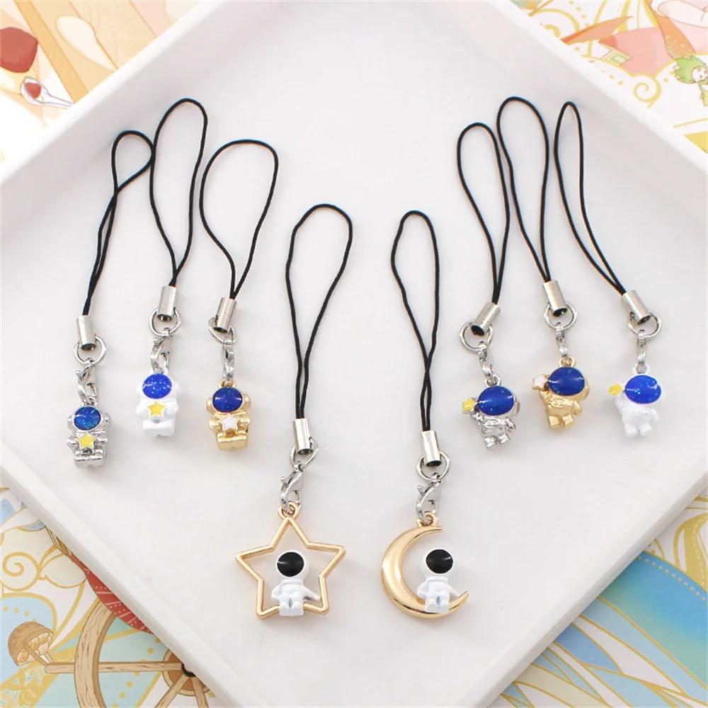 

Spaceman Astronaut Phone Strap Astronaut Mobile Phone Charms Cartoon Phone Pendent Couple Gifts gold-Holding star