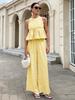 Completo da donna con crop top senza maniche a quadretti Vichy e pantaloni a gamba larga