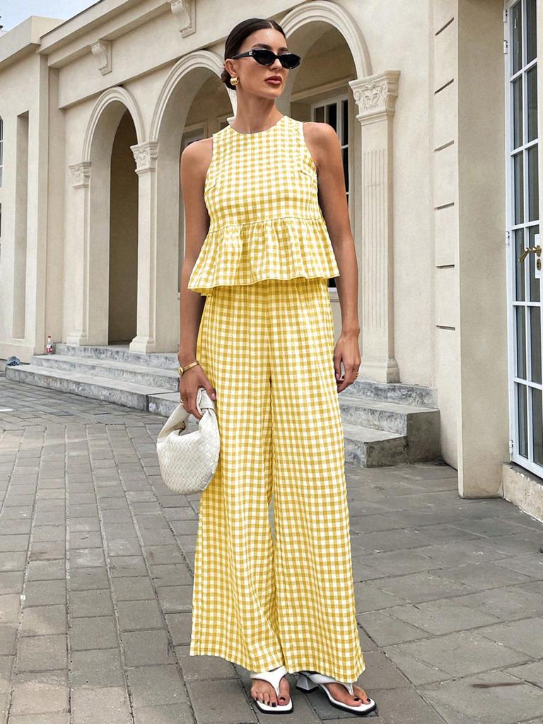Completo da donna con crop top senza maniche a quadretti Vichy e pantaloni a gamba larga