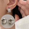 Hollow Double Happiness Circle Earrings: Retro Fashion Style for Women. Needle Back, Versatile & Individualistic Design.
