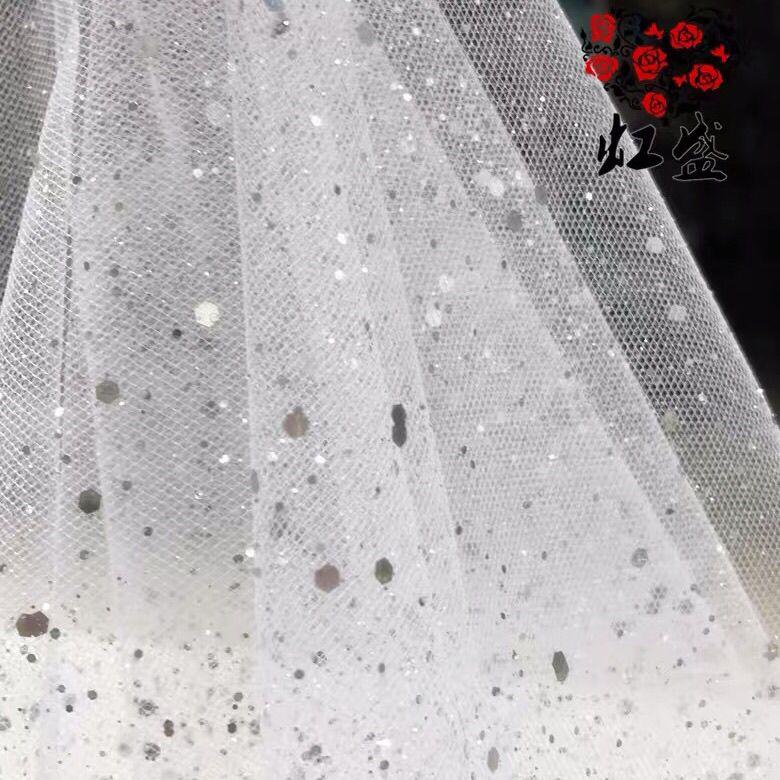 Shiny gilded sequined sheer chiffon fabric suitable for wedding dresses formal gowns and DIY handmade clothing fabrics