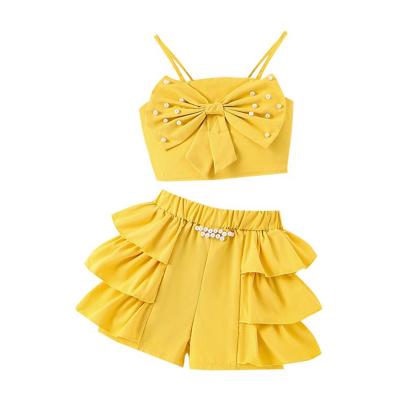 Dziecięcy strój casualowy letni dziewczęcy modny halter perłowa kokarda + spódnica tortowa szorty garnitur