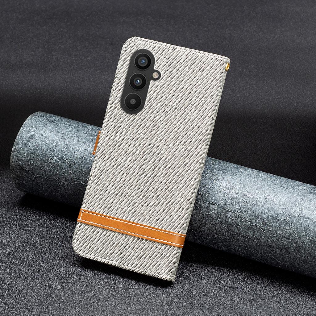 For Samsung Galaxy A24 4G (162.1 x 77.6 x 8.3mm) Splicing PU Leather Phone Cover Jeans Cloth Phone Case with Stand Wallet