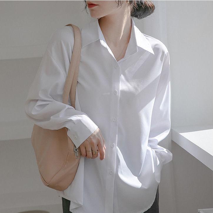 Elegant Loose White Shirt for Women - Spring & Autumn, High-End French Design with a Professional, Slightly Mature Hong Kong Style.