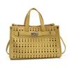 High-end cut-out handheld tote bag for women 2025 new fashion design large-capacity commuter mother-in-law bag crossbody bag