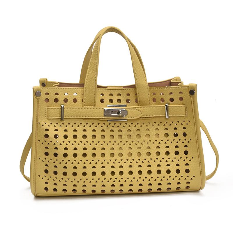 High-end cut-out handheld tote bag for women 2025 new fashion design large-capacity commuter mother-in-law bag crossbody bag