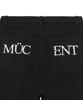 Mucent Lacsen Crack Back Lettering Bootcut Pants